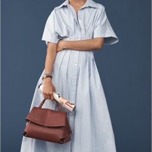 THE TOBIE BUTTON-FRONT PLEATED SHIRT DRESS BY EXQUISE